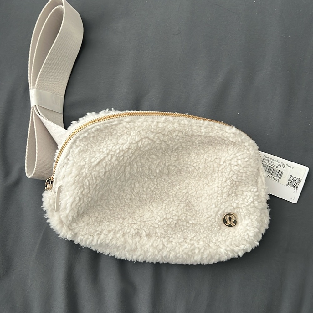 And new Lululemon white crossbody belt bag with Shepard print